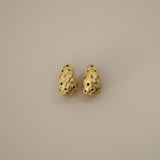 eztli earrings, gold woven texture in a teardrop shape