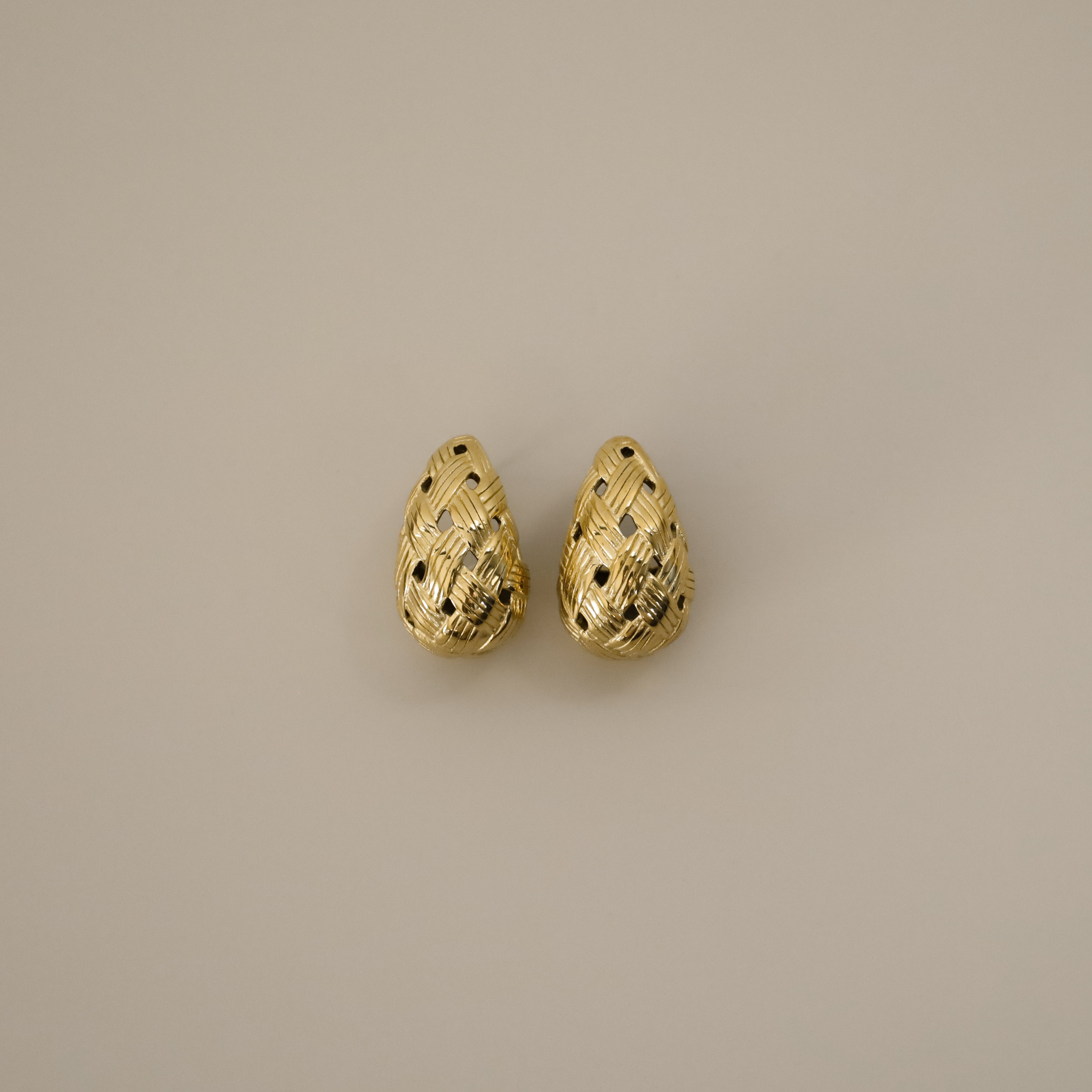 eztli earrings, gold woven texture in a teardrop shape