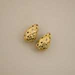 eztli earrings, gold woven texture in a teardrop shape