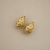 eztli earrings, gold woven texture in a teardrop shape