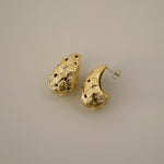 eztli earrings, gold woven texture in a teardrop shape