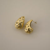 eztli earrings, gold woven texture in a teardrop shape