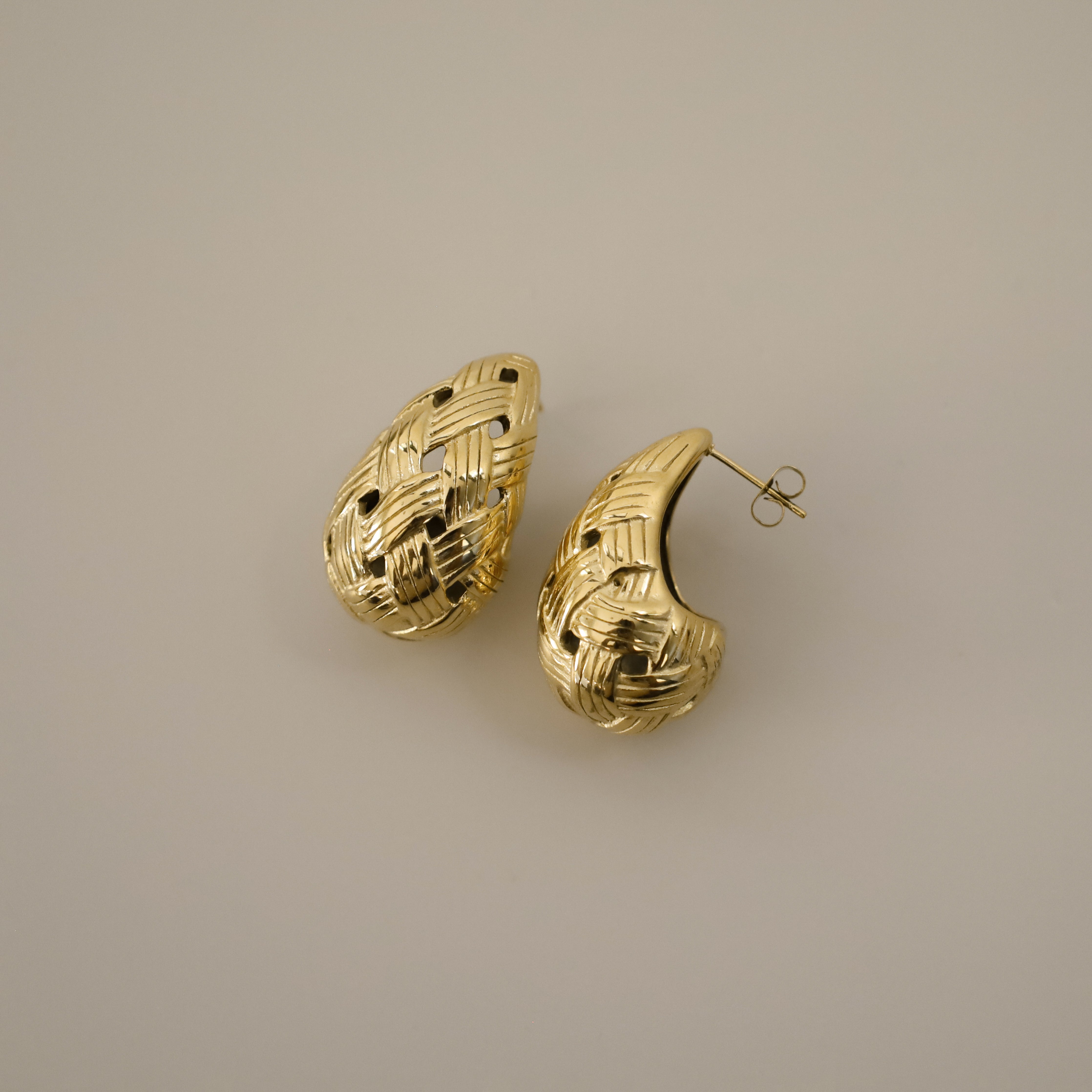 eztli earrings, gold woven texture in a teardrop shape
