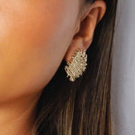 eddard earrings, gold textured design that resembles woven strands