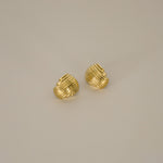 ewadi earrings, gold, distinctive staggered, layered design with a ribbed texture that wraps around in a curved, dome-like shape