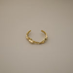 bakar bangle, gold bold cuff with an organic, textured design