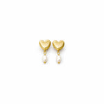 Gold heart-shaped earrings with pearl drops on a white background