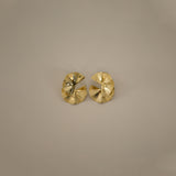 elili earrings, gold bold statement earrings with a wavy double fan-like shape and detailed with fine ribbed lines