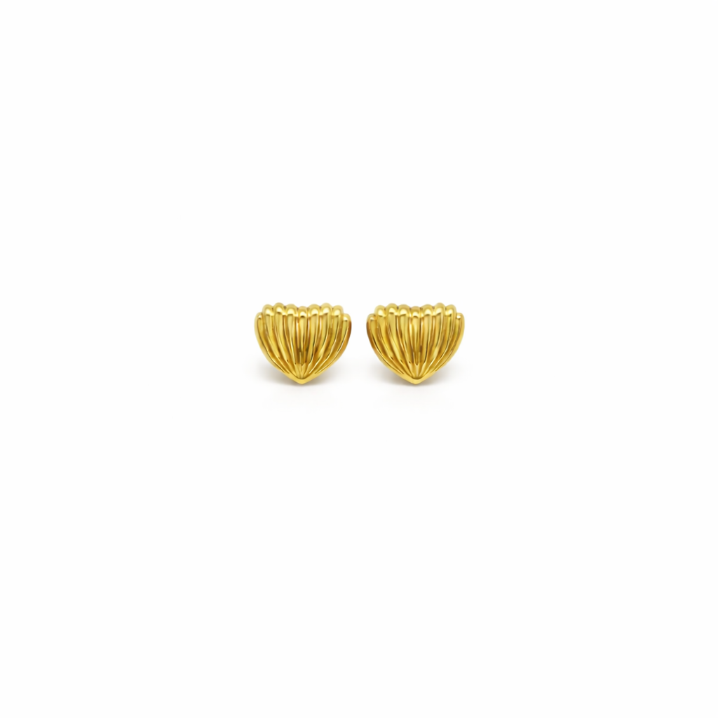 Pair of gold heart-shaped earrings on a white background