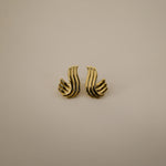 estri earrings, vintage inspired, gold, ribbed, fluid, wave-like form that wraps gently around the earlobes