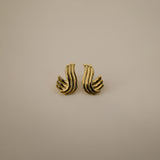 estri earrings, vintage inspired, gold, ribbed, fluid, wave-like form that wraps gently around the earlobes