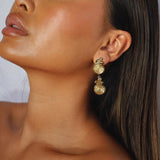 ebrilla earrings, gold drop earrings featuring a captivating spiral design, gracefully descending in two connected tiers