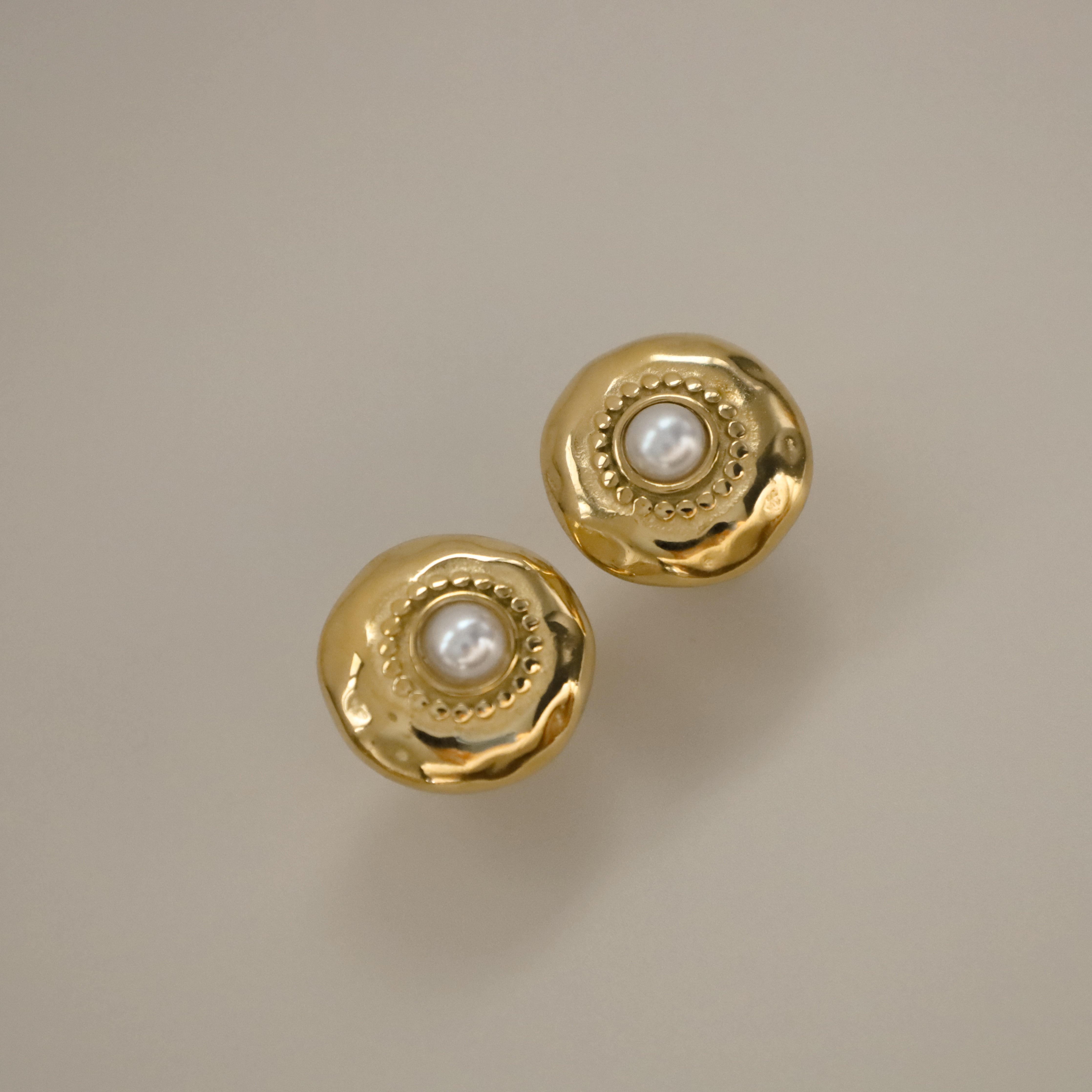 edelle earrings, gold stud earrings with hammered finish and pearl center