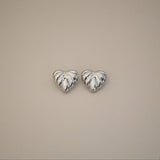 elisma earrings, silver heart-shaped design and thick ribbed detailing