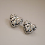 elisma earrings, silver heart-shaped design and thick ribbed detailing