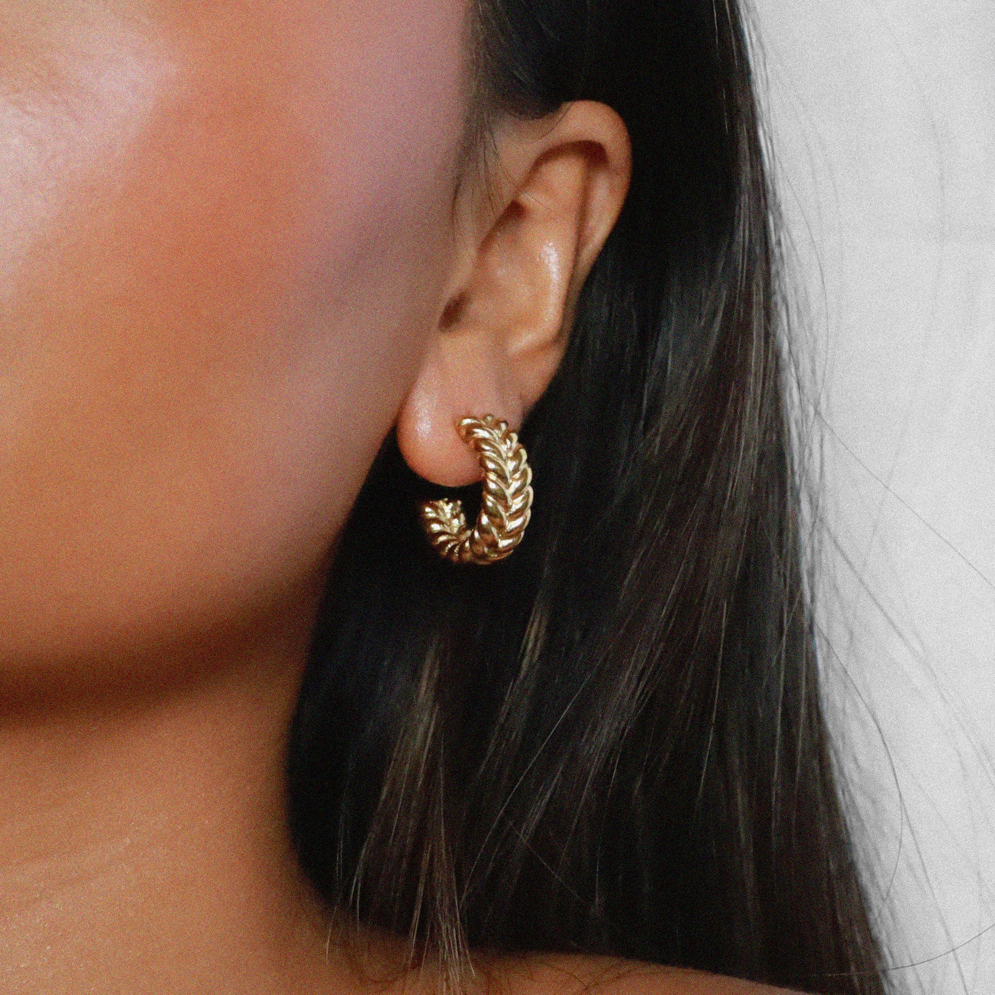 elme earrings, gold hoops with textured braided design