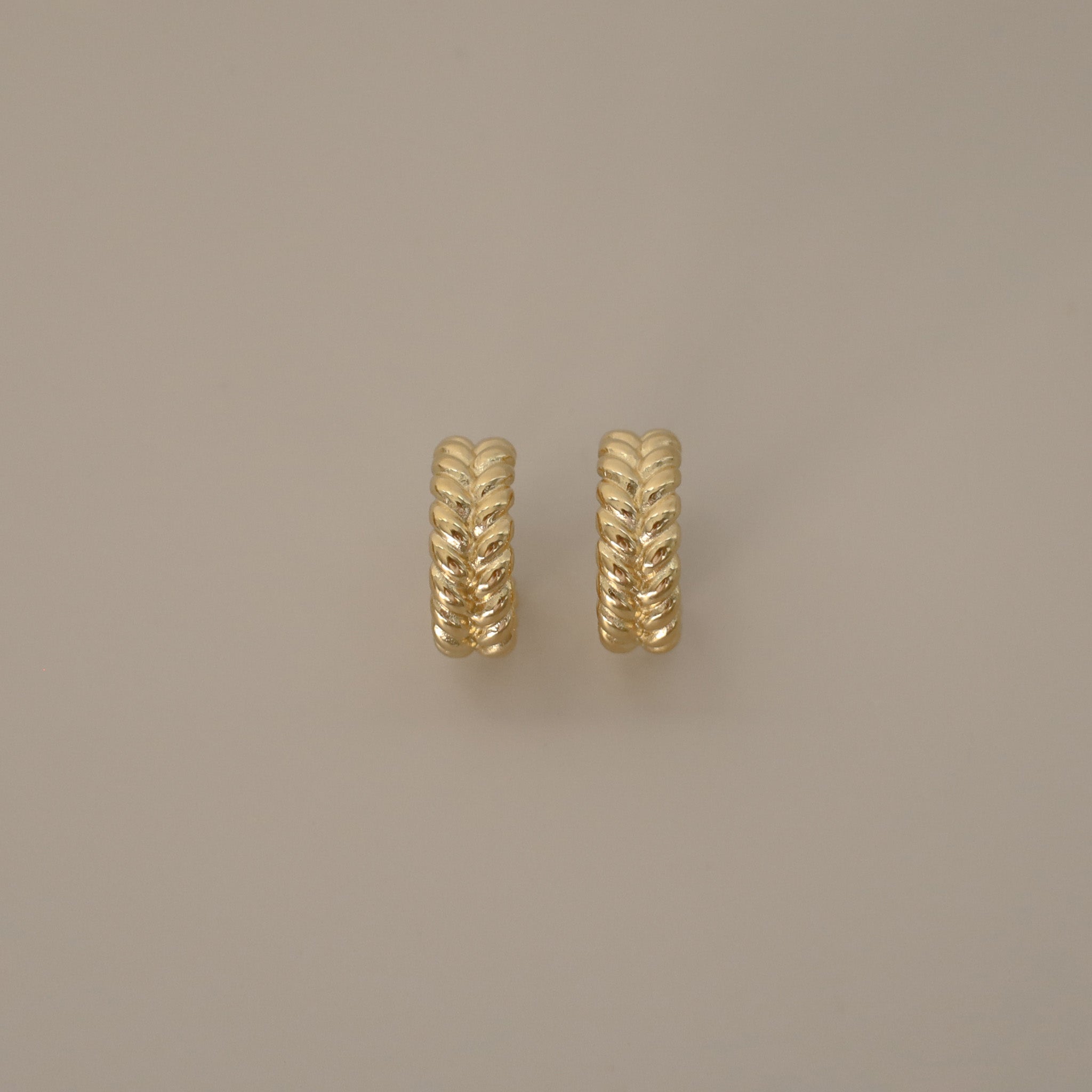 elme earrings, gold hoops with textured braided design