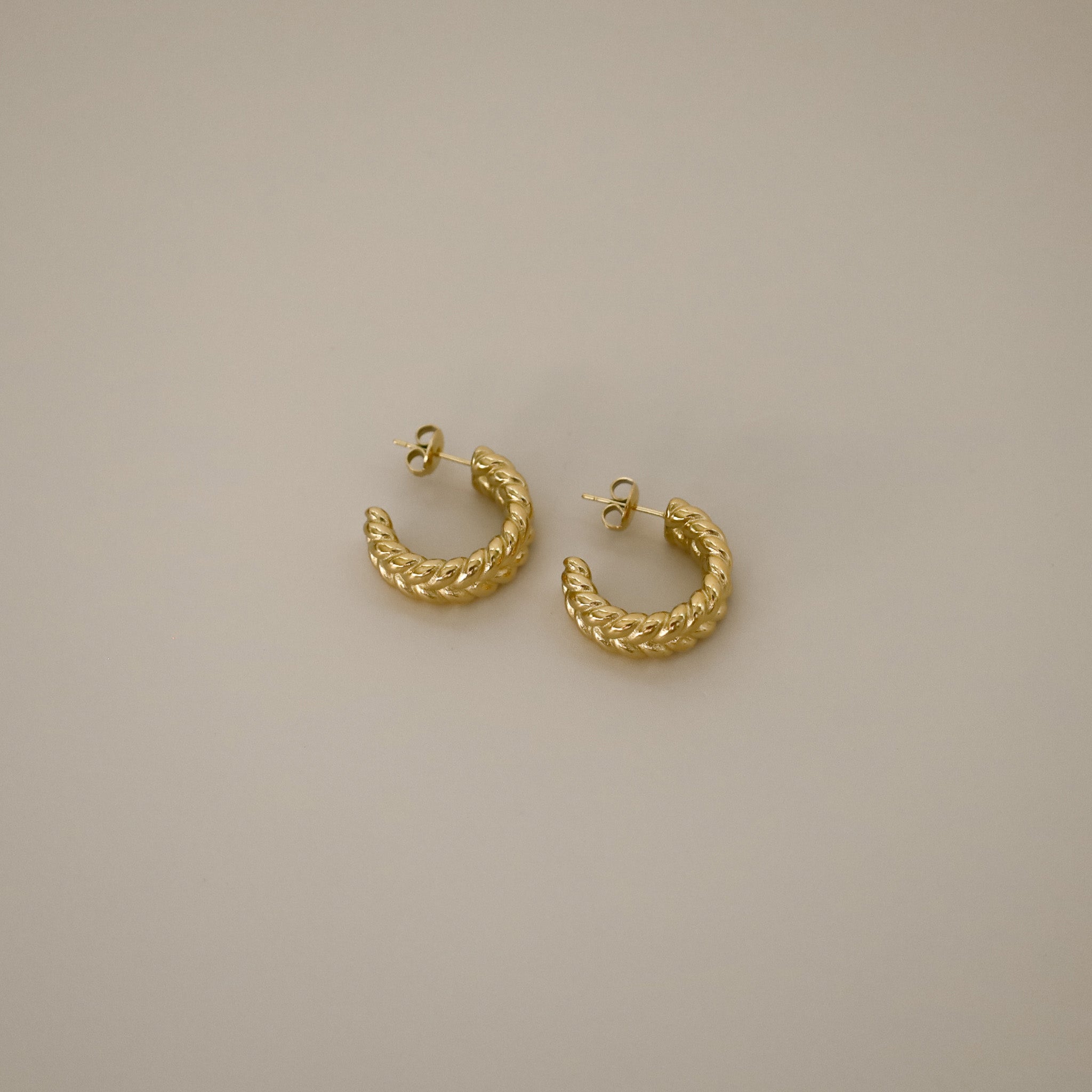 elme earrings, gold hoops with textured braided design