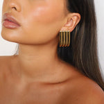 ewella earrings, gold rectangular-shaped statement earrings that feature a thick vertical ribbed design