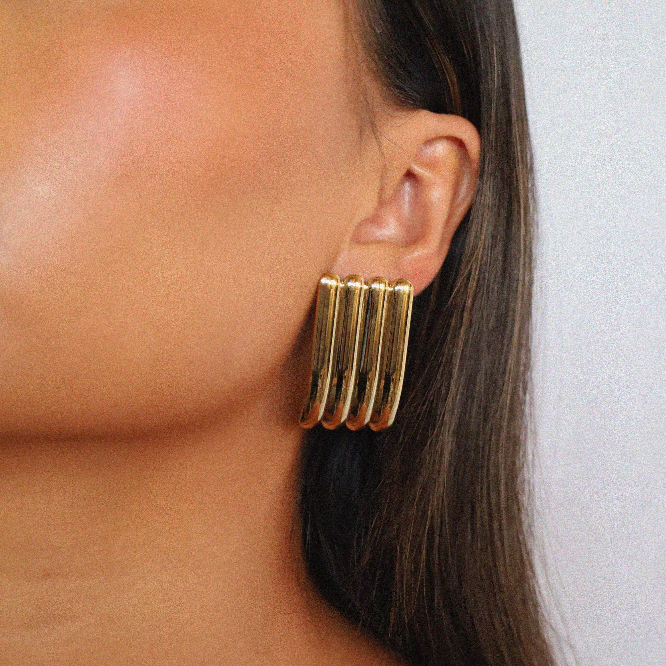 ewella earrings, gold rectangular-shaped statement earrings that feature a thick vertical ribbed design