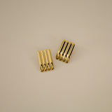 ewella earrings, gold rectangular-shaped statement earrings that feature a thick vertical ribbed design