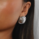 ezana earrings, silver rectangular earrings with puffy center in a scale design and smooth outer edge